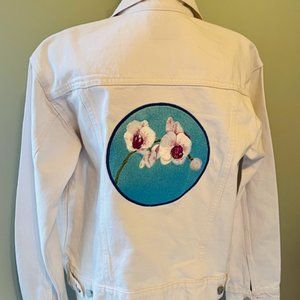 White Denim Jacket Embroidered with an Orchid Design on the back